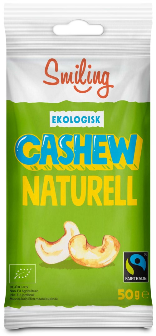 A green and white package of organic cashew nuts with a Fairtrade logo, showing nuts at the bottom.