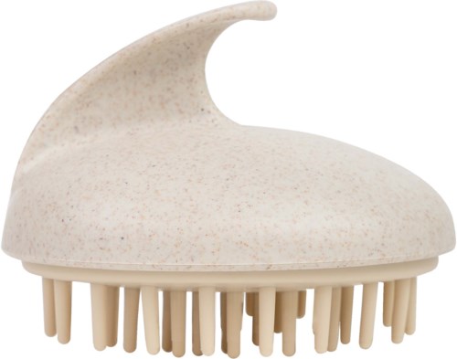A massage brush with a whale-shaped handle and many bristles underneath.