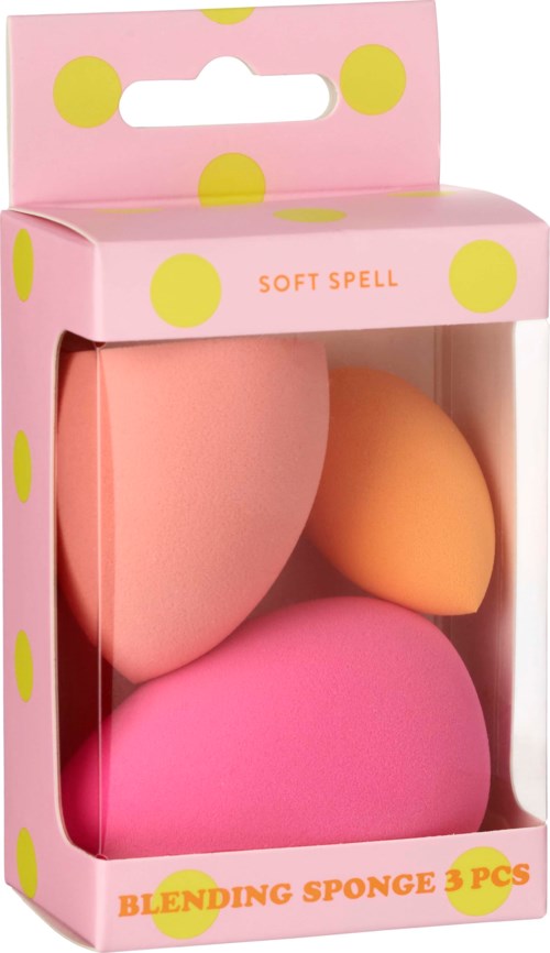 A pink box with big yellow dots holds three blending sponges in peach, orange, and pink colors.