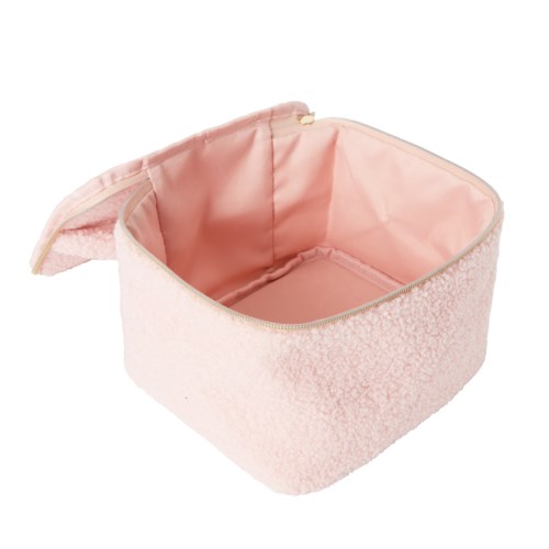 Mjuk rosa makepås med dragkedja, tomt inuti, strukturert yttre. Perfekt för förvaring av skönhetsprodukter.