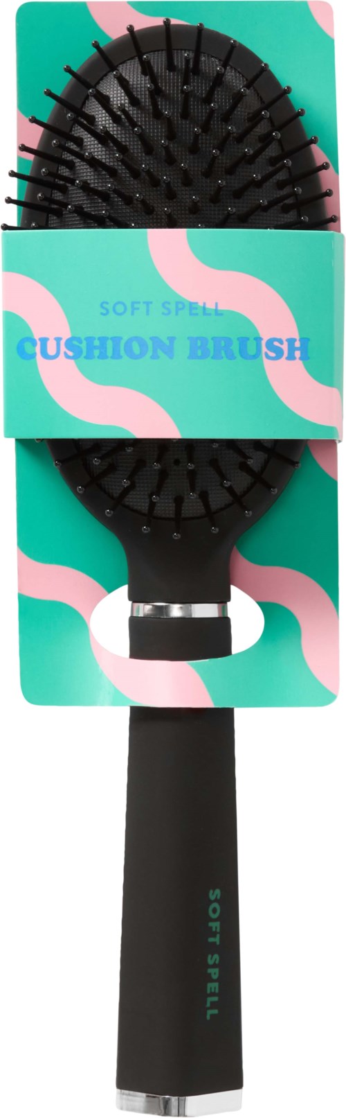 Eine schwarze Haarbürste mit gebogener Form auf bunt verpacktem Etikett, das 'CUSHION BRUSH' sagt.