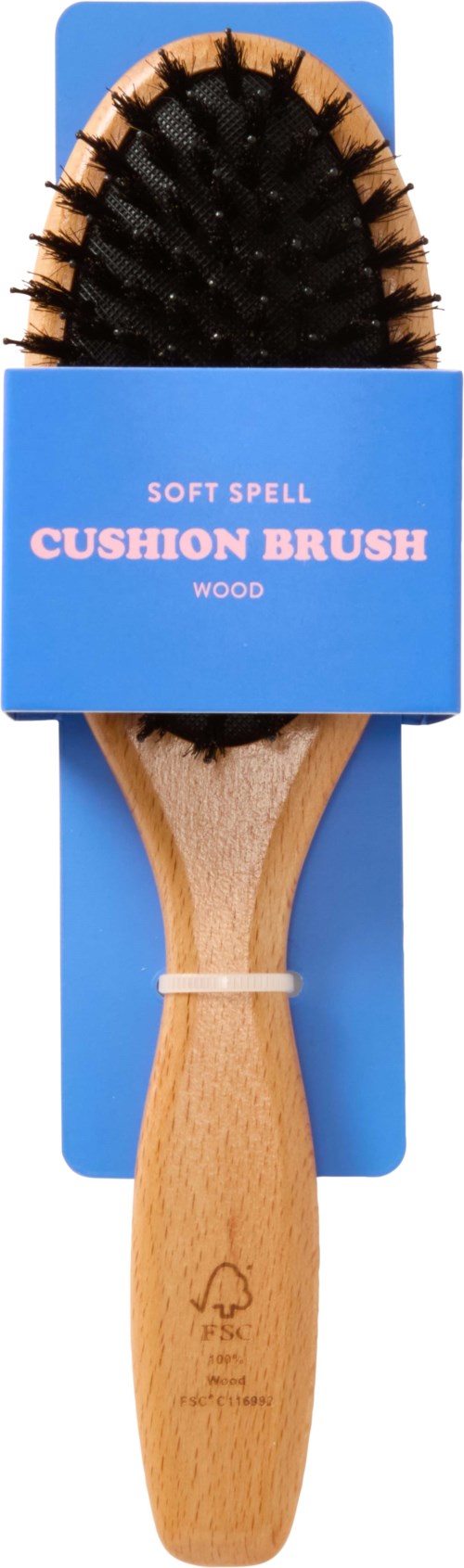En trebørste med svarte bust, vist i blå emballasje som sier 'Soft Spell Cushion on Brush Wood,' egnet for hår.