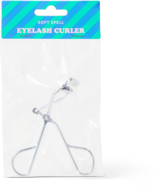A soft spell eyelash curler in packaging with blue and green stripes at the top.