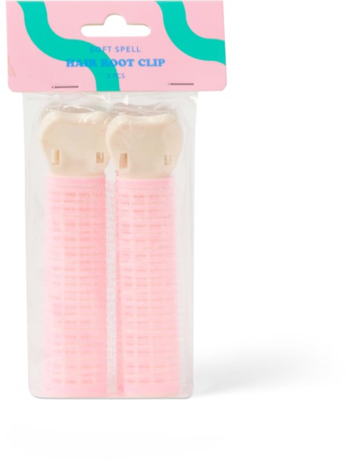 Pink soft spell hair root clips in clear plastic package with a pink and blue label.