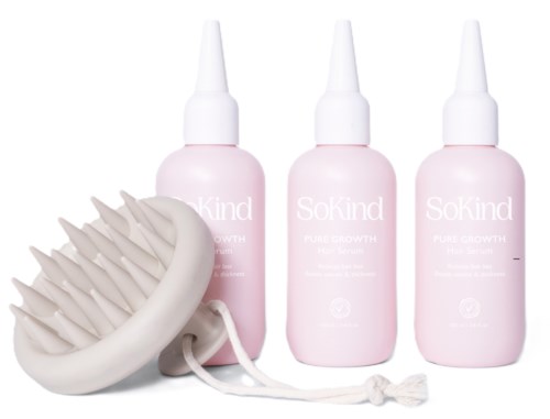 Drei rosa Flaschen mit Haarwuchsspray und eine weiße Kopfhautmassagebürste mit weichen Zähnen.
