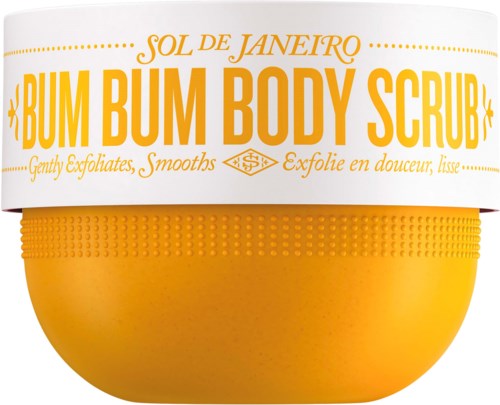 Ein gelber Behälter mit weißem Deckel, beschriftet mit 'BUM BUM BODY SCRUB' zum Peelen und Glätten der Haut.