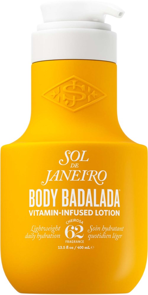 Eine gelbe Lotionflasche mit Pumpe, beschriftet mit weißem und orangefarbenem Text über Körperlotion.