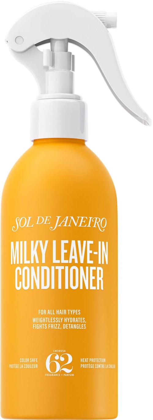 Keltainen pullo Sol de Janeiro Milky Leave-In Conditioner ja valkoinen suihkepää.