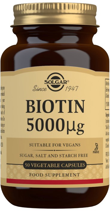 A brown bottle of Solgar Biotin 5000 mcg capsules, labeled as vegan, sugar and starch free, containing 50 vegetable capsules.