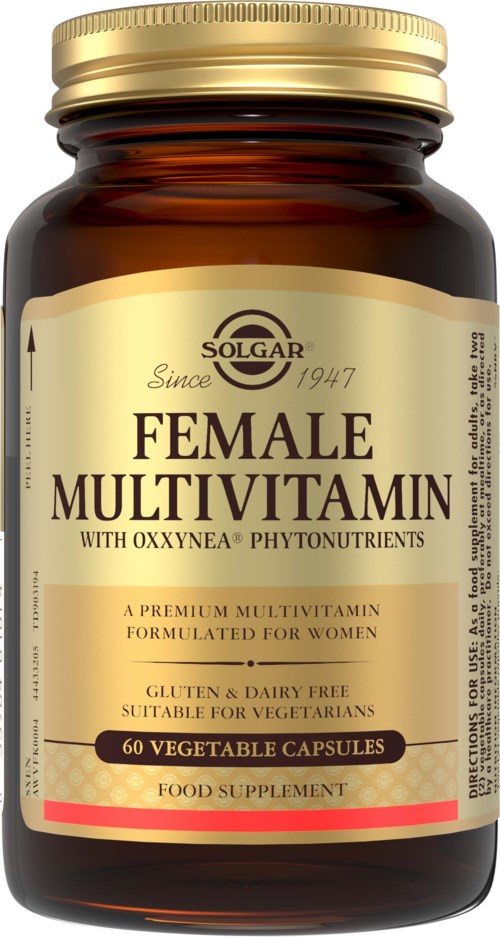 En brun flaska från Solgar med kvinnomultivitamin, etikett i beige och guldkapsel, för kvinnor.