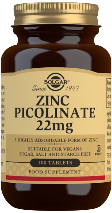 Brown bottle with a yellow label, containing zinc picolinate tablets, recommended for vegans. Cap is gold-colored.