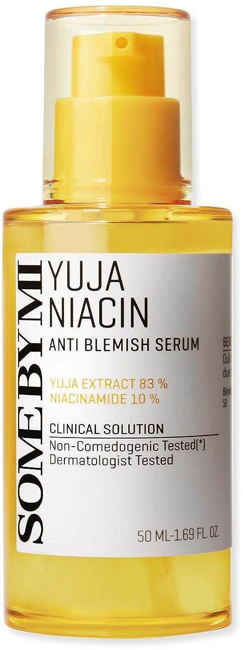 A yellow bottle labeled 'SOME BY MI Yuja Niacin Anti Blemish Serum' with a pump dispenser.