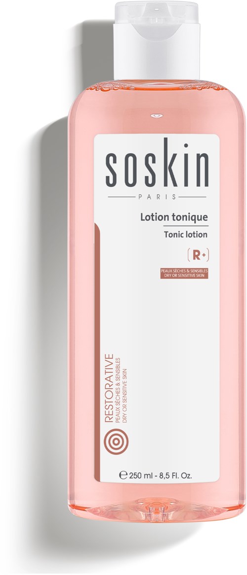 A pink bottle with white and gray label, called Soskin, containing toning lotion for skin care.