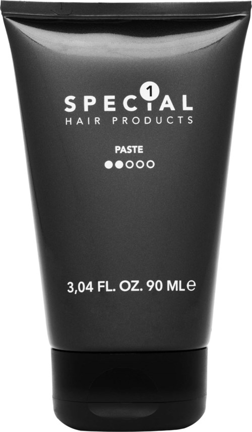 Een zwarte tube met de tekst 'SPECIAL HAIR PRODUCTS', die aangeeft dat het een pasta is, bevat 3,04 fl oz, 90 ml.