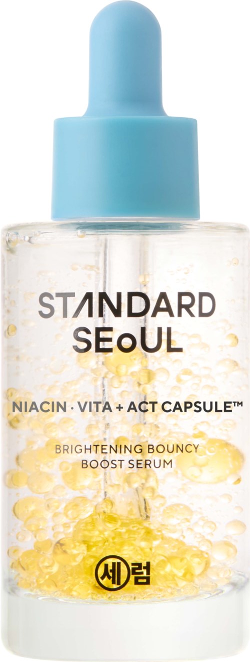 Clear serum bottle with yellow capsules inside, labeled as brightening bounce boost serum from Standard Seoul.