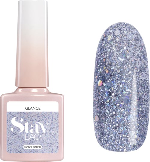 Een flesje glinsterende blauwe nagellak naast een bijpassende glittersample.