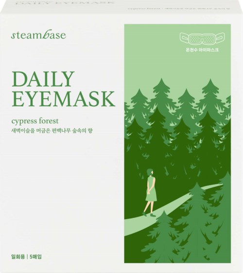 Een groen-witte doos met boslandschap, vrouw wandelt, en gezichtsmaskerillustratie. Tekst over dagelijkse oogmasker.