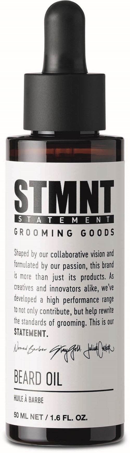 A dark glass bottle with a spray dropper, labeled 'STMT Beard Oil' for grooming beards.