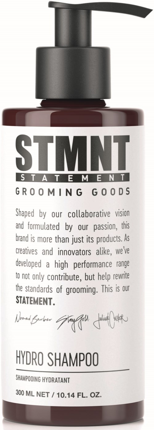 Eine Flasche mit Hydro-Shampoo für das Grooming mit Pumpe, beschriftet mit einer Aussage über die Leidenschaft und Standards der Marke.