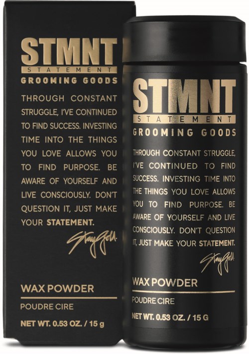 A black box and a black container of grooming wax powder with gold and white text on them.