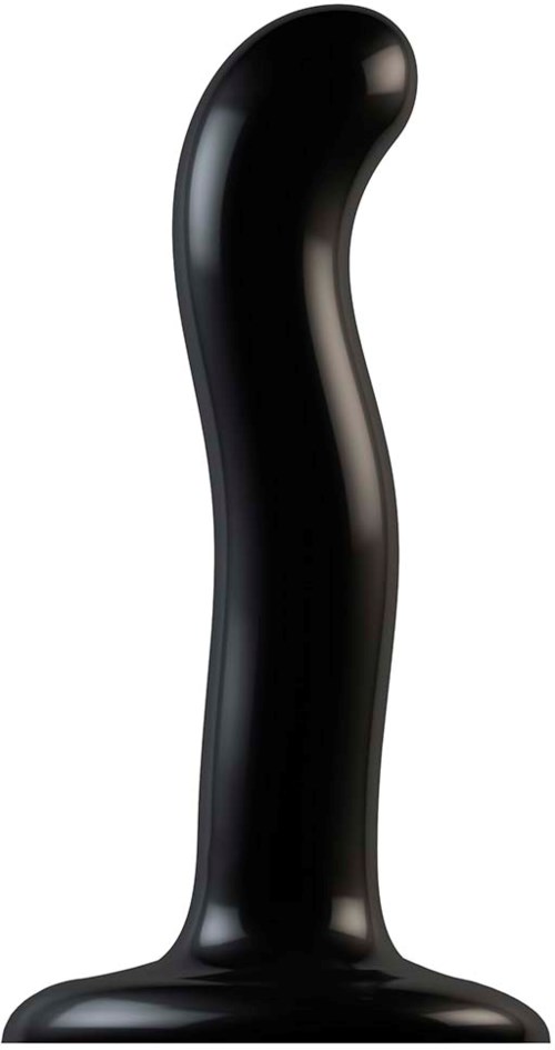 Ein schwarzer gebogener Gegenstand steht aufrecht und ähnelt einem modernen, eleganten Design mit glatter Oberfläche.