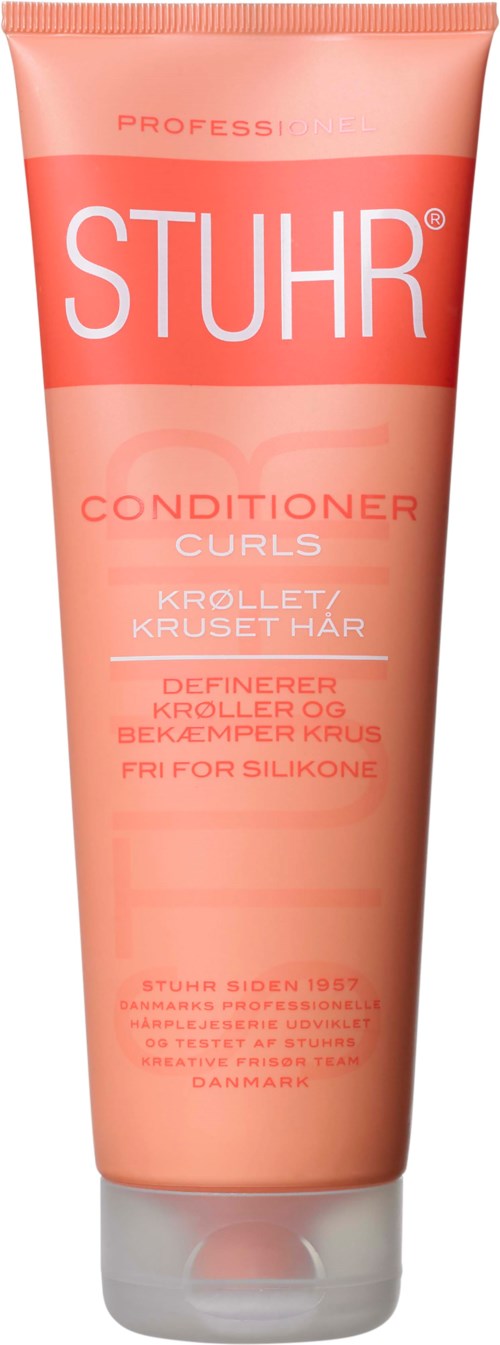 A pink tube labeled STUHR Conditioner for curly hair, free from silicone, with instructions in Danish.