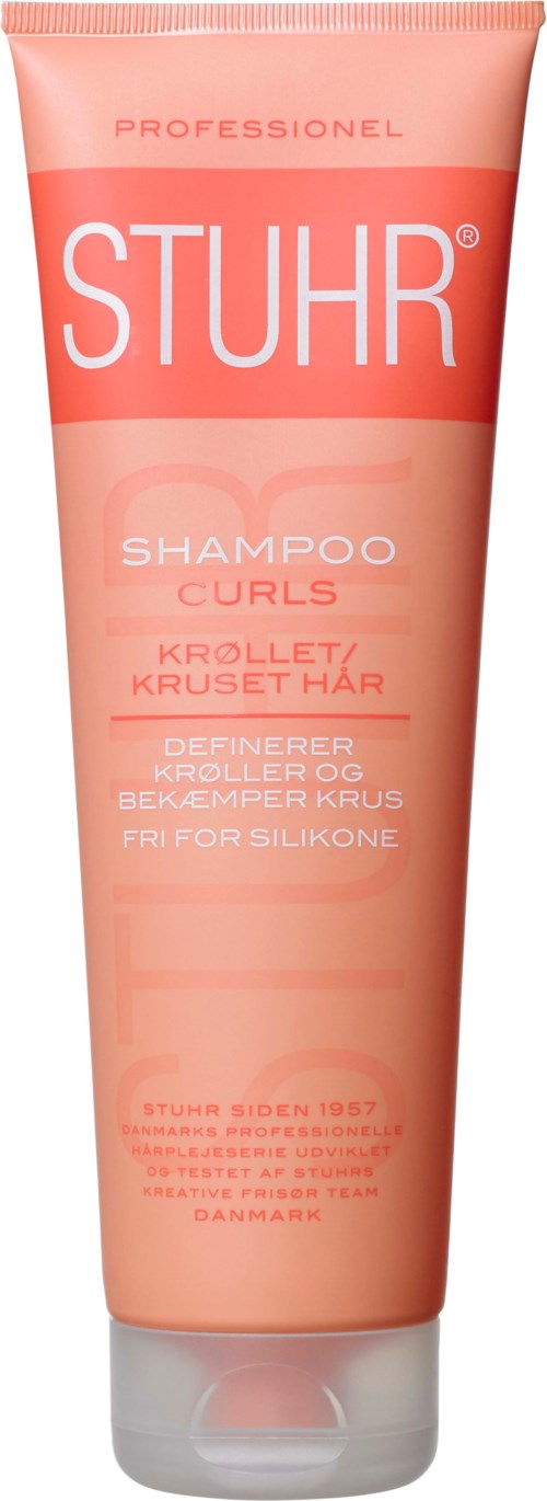 A tube of pink shampoo for curly or frizzy hair with brand name and some information in Danish.