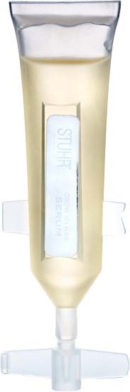 A tube of skincare product with a clear label, designed for easy application. It has a pump and cap.