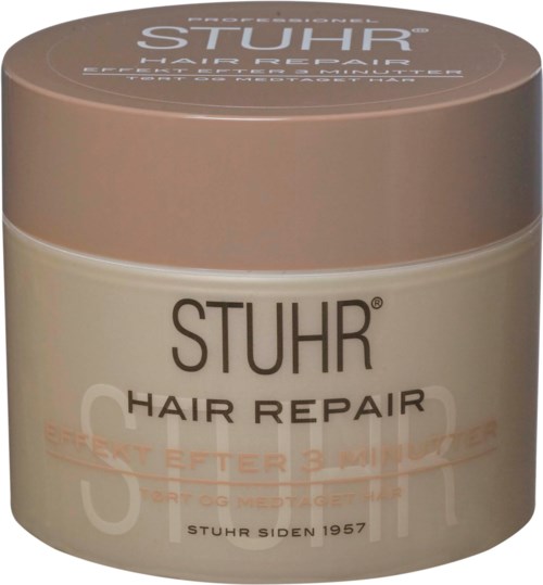 A jar of Stuhr hair repair cream with a brown lid, labeled for hair restoration after damage.