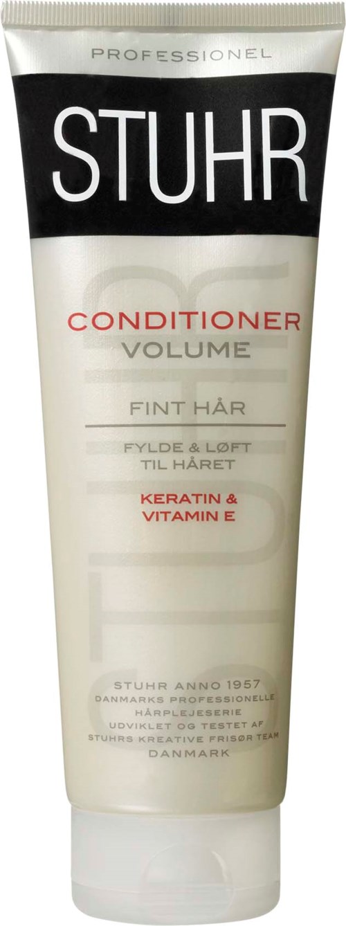 A tube of professional hair conditioner labeled for volume, containing keratin and vitamin E.