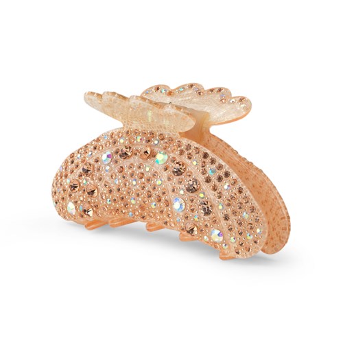 En rosa hårklemme dekorert med mange glitrende rhinestones, formet som en sløyfe.