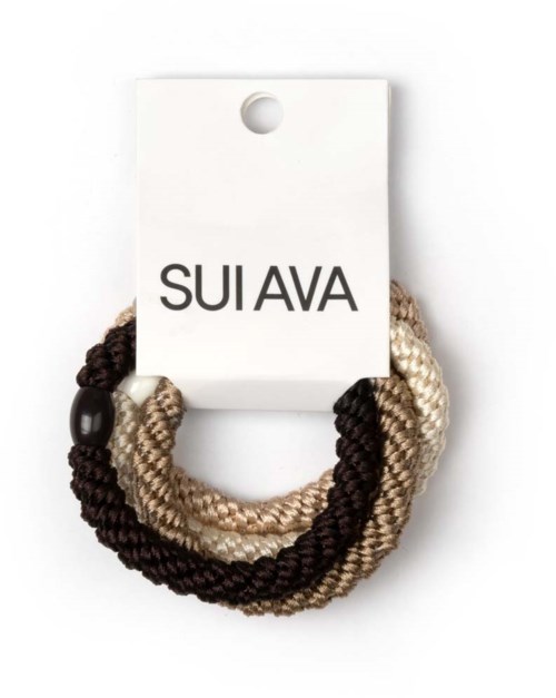 A pair of braided, beige and dark brown, fabric bracelets attached to a white card with the text 'SUI AVA'.
