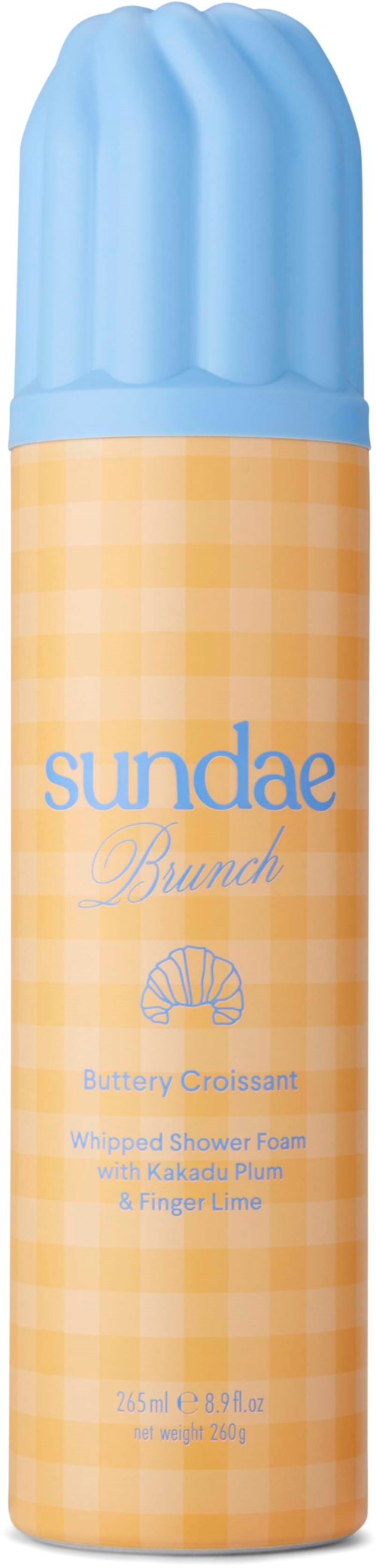 Een kleine sprayfles met blauwe dop en een geel geruit label. Het heet Sundae by Brunch en heeft een citrusgeur.