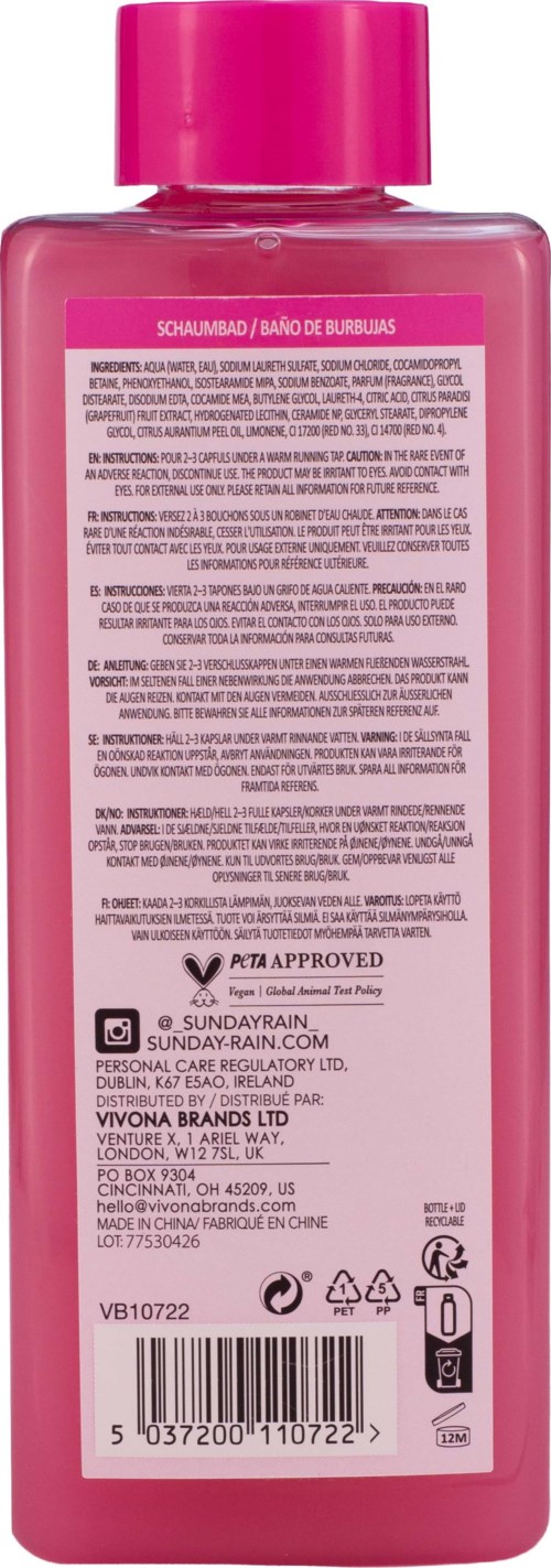 Baksidan av en rosa schampobil med produktinformation och ingredienser listade.
