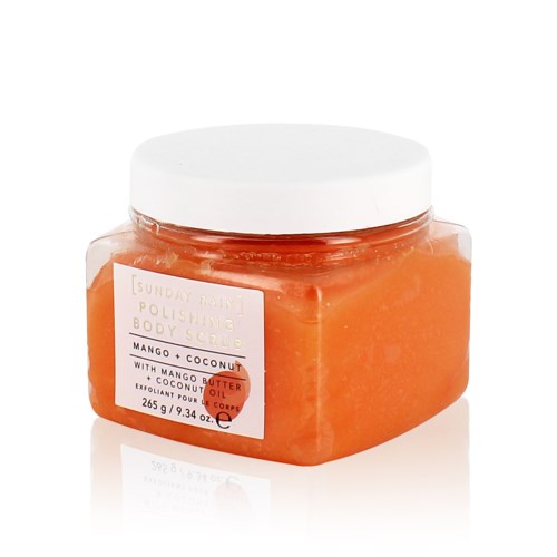 Een pot met oranje mango en kokos lichaamscrème met witte deksel, gelabeld 'polishing body scrub' en 'Sunday Rain'.