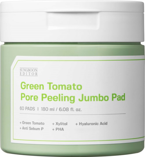 Een pot met groene tomaat pore peeling jumbo pads, bevat 60 pads met ingrediënten zoals xylitol en hyaluronzuur.