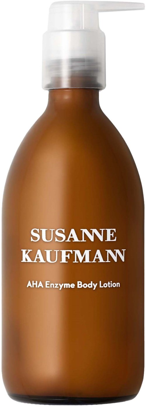 En brun flaska med pump, märkt Susanne Kaufmann AHA Enzyme Body Lotion.