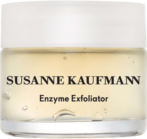 Purkkia, jossa lukee 'Susanne Kaufmann Enzyme Exfoliator' ja sisältää kirkasta geelituotetta, valkoinen kansi.