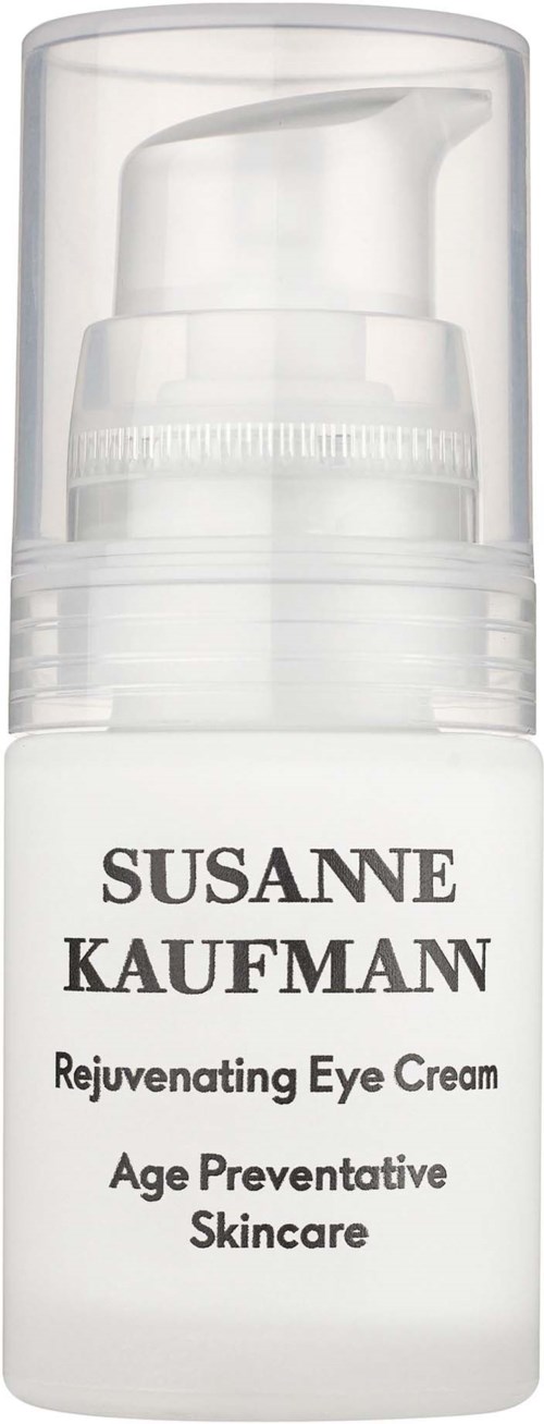 A white bottle with a clear cap and pump, labeled with a skincare product for eyes by Susanne Kaufmann.