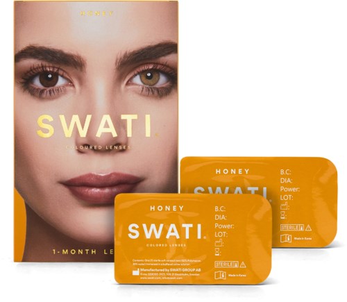 Doos met oranje contactlenzenverpakkingen met een vrouw haar gezicht en ogen en kleinere containers van lenzen.