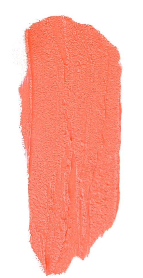 A swatch of peach-colored cosmetic or art product with a textured surface and uneven edges.