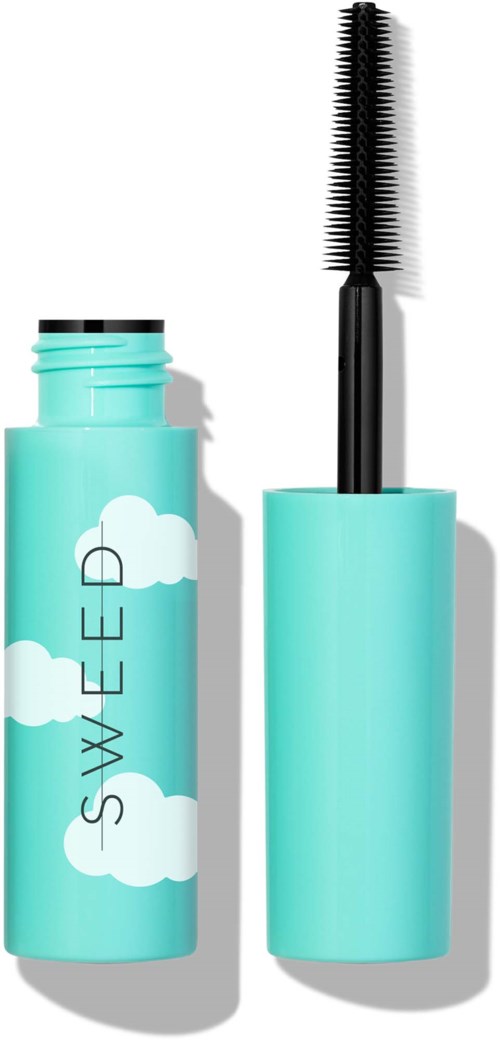 Blue mascara tube with clouds design and a black wand inside. The wand has a tall, comb-like brush.