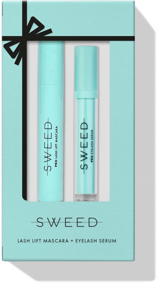 A light blue box contains a lash lift mascara and eyelash serum with black ribbon decoration on top.