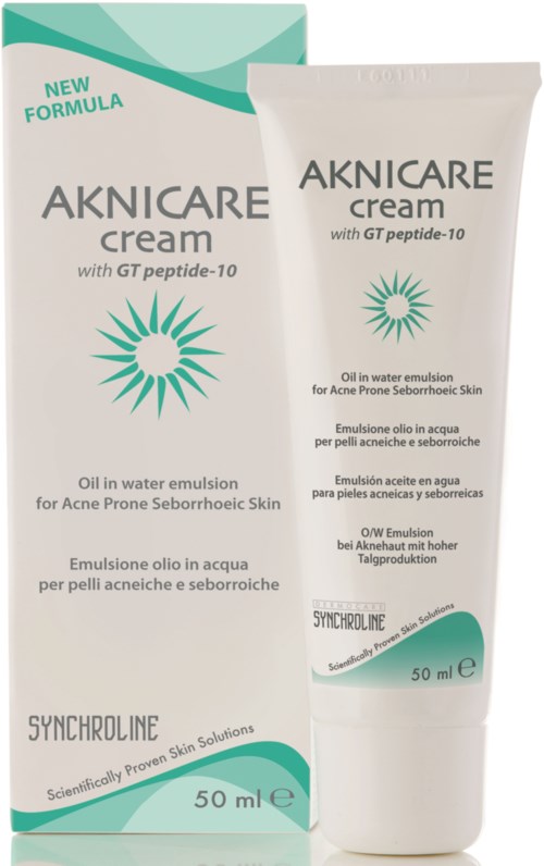 A tube of Aknicare cream and its box, both promoting oil-in-water emulsion for acne-prone skin.