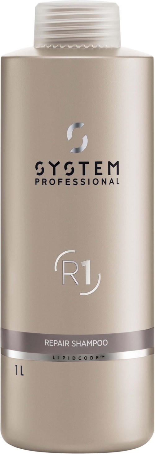 Beige shampoefles met label 'System Professional Repair Shampoo R1', 1 liter, met een zilveren band onderaan.