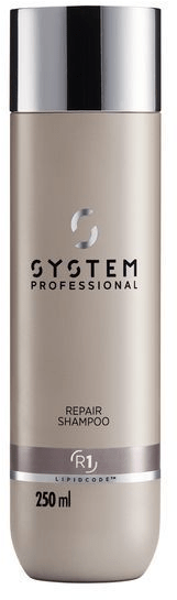 Een beige fles met een zilveren deksel, gemarkeerd 'GYSTEM PROFESSIONAL REPAIR SHAMPOO 250 ml'.