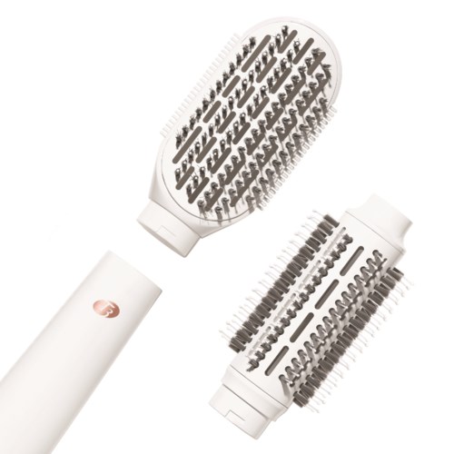 Two round hairbrush rollers with bristles and a white handle are shown.