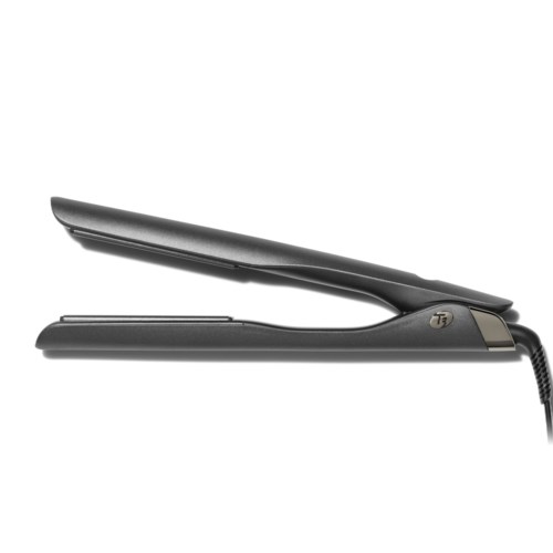 A black hair straightener with a clamp and power cord.