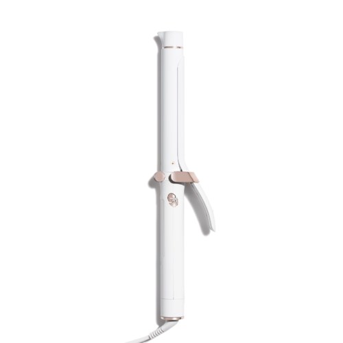 A white curling iron with pink accents and a handle, standing vertically.