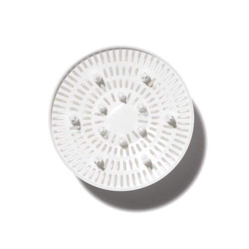 A white circular object with small protrusions around the center, possibly a ventilator or a filter.